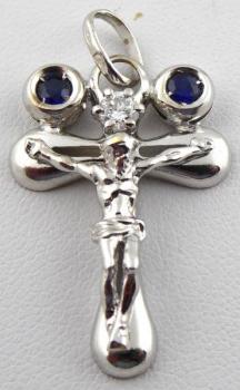 Kreuz aus Weigold mit Diamant und gepaarten blaue