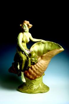 A female sitting on a shell A female sitting on a shell
