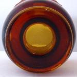 Vase aus Bernsteinglas, goldene und silberne Rosen Vase aus Bernsteinglas, goldene und silberne Rosen