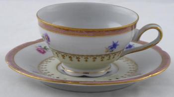 Kaffeetasse mit rosafarbener Oberlinie und vergold Kaffeetasse mit rosafarbener Oberlinie und vergold