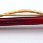 Goldbrosche mit Karneol und Diamanten Goldbrosche mit Karneol und Diamanten