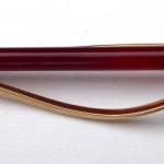 Goldbrosche mit Karneol und Diamanten Goldbrosche mit Karneol und Diamanten