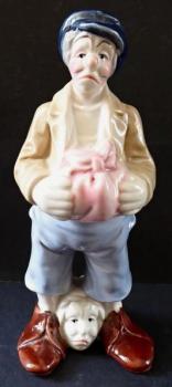 Statue eines Mannes mit seinem Kopf an seinen Füße Statue eines Mannes mit seinem Kopf an seinen Füße