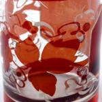 Kleines Glas mit Medaillon und Weinblttern